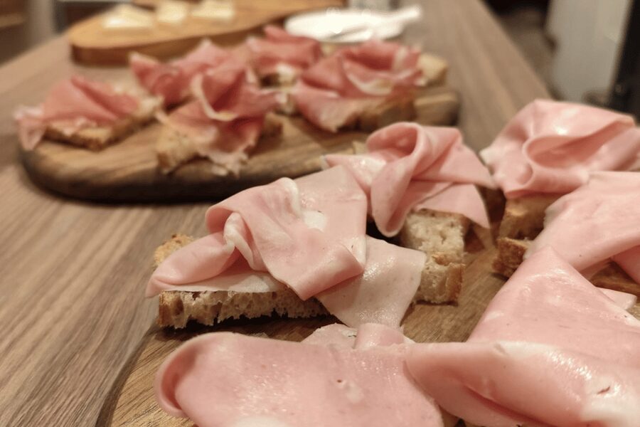 Bologna: Food and Wine Tasting with Interactive Game - Who’s guiding you, and how the atmosphere feels