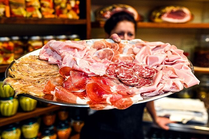 Bologna Food & Market Tour with 6 Tastings, Pasta, Wines & More - Palazzo della Mercanzia: the 14th-century start that sets the tone