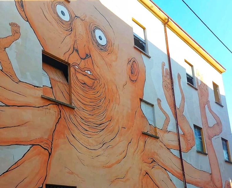 Bologna: Street Art Tour on Electric Bike - The Frontier 2012 Stop: A Specific Piece, Not Just a Vibe