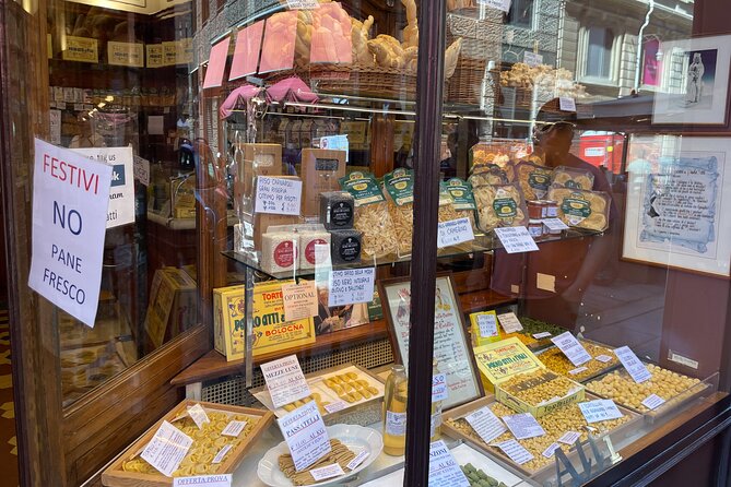 Bologna: Walking Food Tour and Highlights with a Local Guide - The Two Towers pass-by: quick photos, real orientation