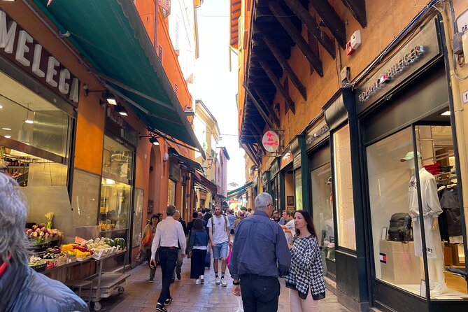 Bologna: Walking Food Tour and Highlights with a Local Guide - Mortadella, bread, and wine: the quickest Bologna lesson