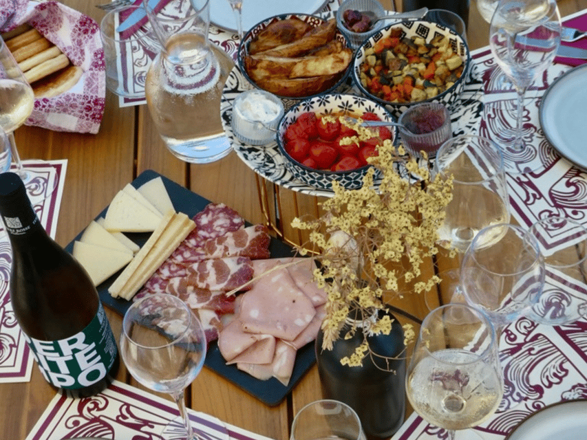Boutique Winery Tour with Wine Tasting & Food in Bologna - Vineyard walk in Colli Bolognesi and the Paese dei Perditempo story
