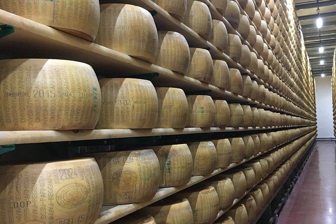 Cars&Food: Lambo, Ferrari, Parmigiano, Balsamic, PrivateTransport - Caseificio Bio Reggiani: Parmigiano-Reggiano, Aging Rooms, and the Smell Factor