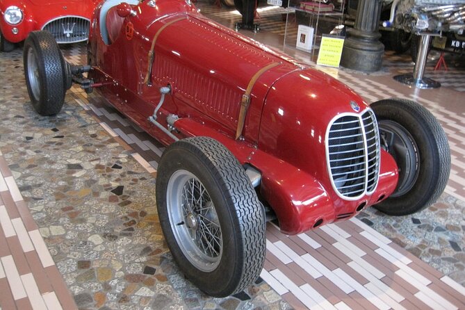 Ferrari | Enzo Ferrari | Lamborghini | Maserati Museums - Tour from Bologna - Starting with the Ferrari Museum in Maranello: trophies, helmets, and rotating models