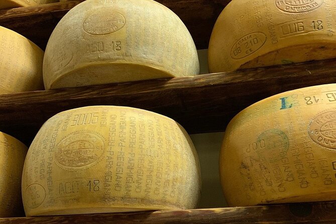 From Parma: Parmigiano,Prosciutto and winery Tour and tasting - Beneceto Cheese Factory: brine room, aging warehouse, and a paired bite